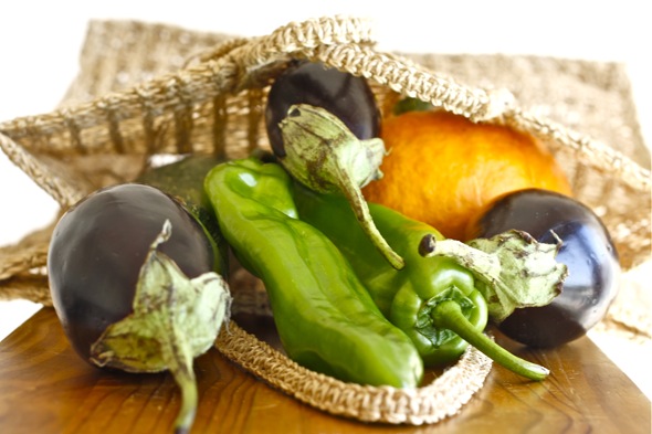 a basket full of late summer veggies